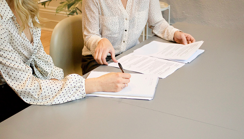 woman filling out a report